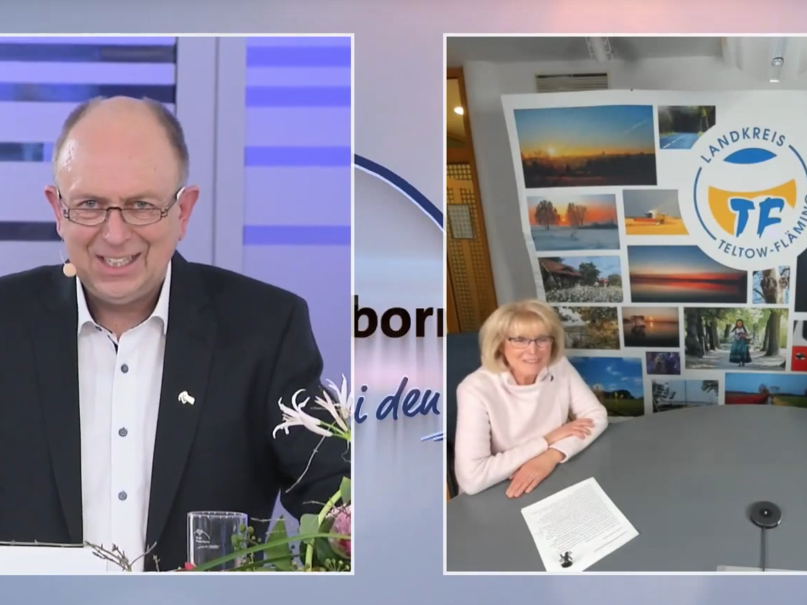 Das Foto zeigt mehrere Personen.